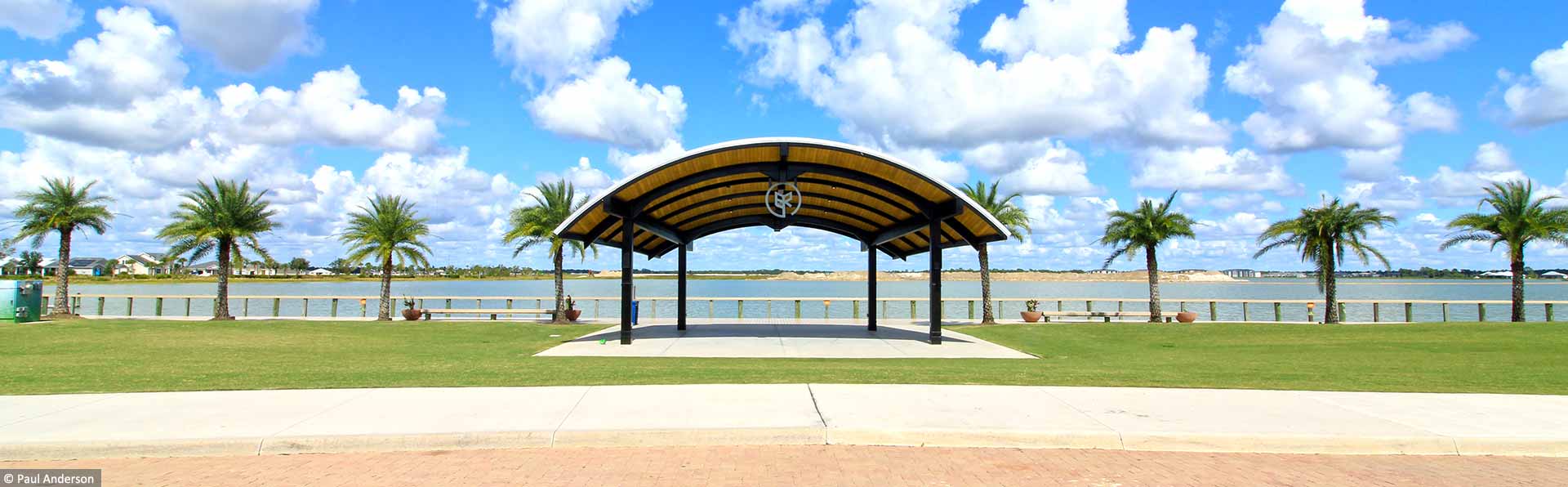 covered band shell overlook large lake