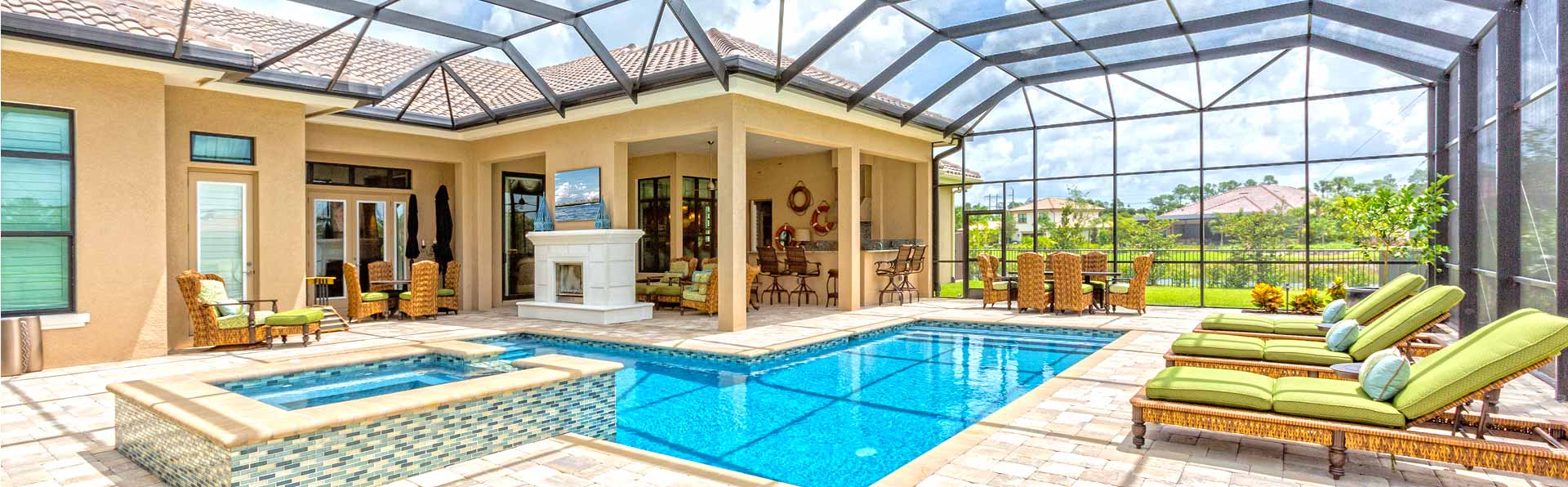pool and spa in a screen-in lanai area
