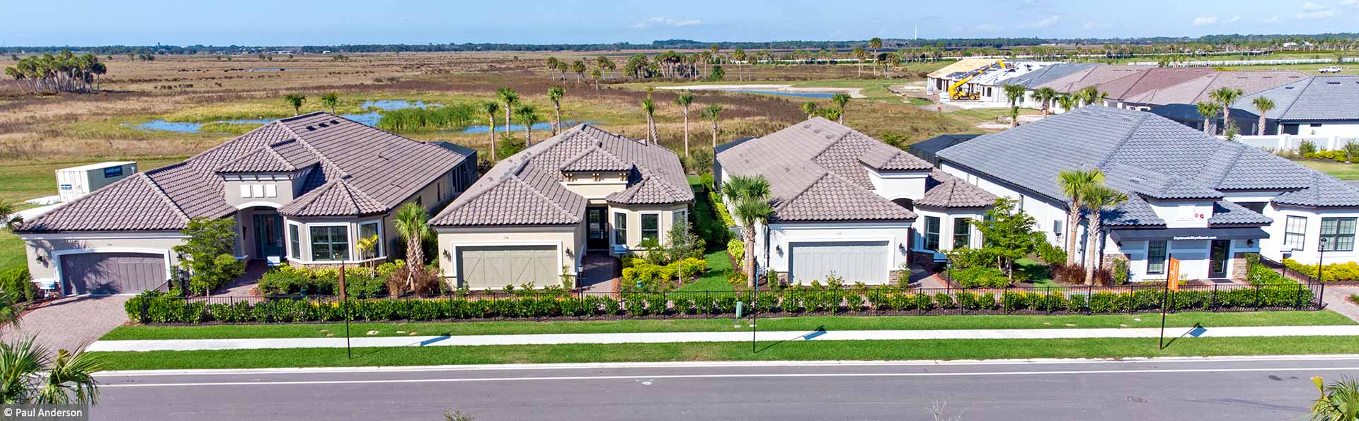 row of Florida homes with tile roofs